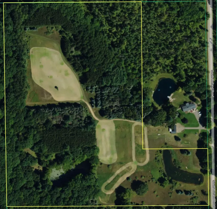 Aerial property overview with fields, ponds and woods
